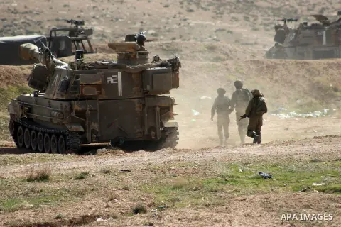 An Israeli army artillery unit takes part in a training session south of the Palestinian village of Yatta, in area C (where Israel retains control) on the outskirts of the town of Hebron, in the West Bank on February 2,...