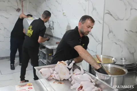 A Palestinian deportee from West Bank Louay Qafisha cooks Khaliliya food in his restaurant in Gaza city on September 17, 2023. Qafisha opened a restaurant called “Khalil Rahman” to transport Khalilian food to Gaza, after...