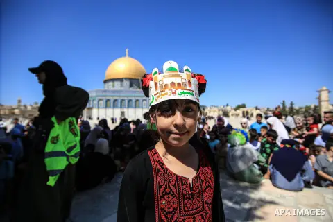 September 27, 2023, Jerusalem: Palestinians gather to commemorate the birth of the Prophet Muhammad, known in Arabic as Mawlid al-Nabawi, outside the Dome of the Rock in the Al-Aqsa Mosque complex, in the Old City of Jer...