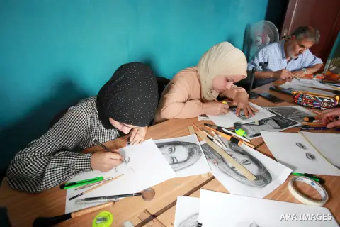 Palestinians attend a charcoal drawing course in Gaza city on September 30, 2023. Charcoal drawing is one of the oldest art forms known to humanity, and is still widely used today thanks to its expressive capabilities. I...