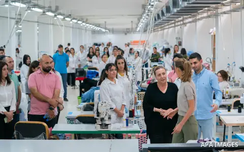 Syrian First Lady Asma al-Assad visits the clothing factory within the Muthanna Production Complex in Tartous countryside in Syria on August 07, 2023. Photo by Syrian Presidency\ apaimages