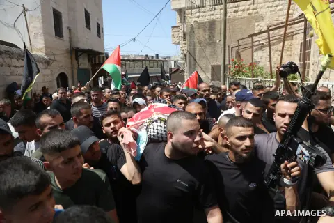 Palestinians carry the body of Othman Abu Khurog, 17, during his funeral procession at Zababdeh village near Jenin in the West Bank, on August 22, 2023. Abu Khurog was killed when clashes erupted in Zababdeh, which Israe...