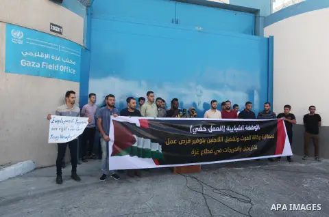 Palestinian graduates take part in a protest to demand job from the United Nations Relief and Works Agency for Palestine Refugees "UNRWA", in front of its headquarters in Gaza City on August 30, 2023. Photo by Omar Ashta...
