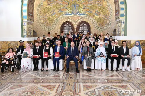 Algerian President Abdelmadjid Tebboune honors outstanding students in the baccalaureate and intermediate education degrees on July 30, 2023. Photo by Algerian Presidency Office/APAimages