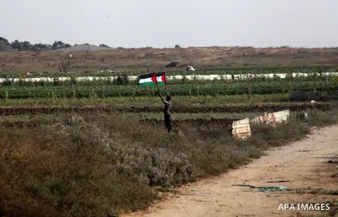 Palestinian protesters burn tires during a demonstration near the fence with Isarel east of Gaza city protesting an Israeli military operation in the West Bank city of Jenin on July 3, 2023. Israel has stepped up operati...