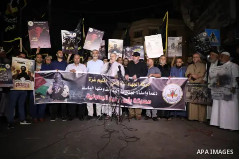 Palestinians hold placards and shout solgans in Gaza city during a protest against an ongoing Israeli military operation in Jenin on July 4, 2023. Israel's biggest military operation for years in the occupied West Bank c...