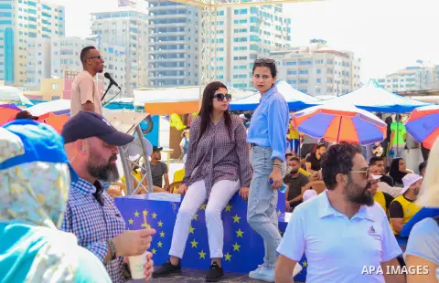 delegation from the European Union take part in the sailing and rowing championship on the shore of the Mediterranean, in Gaza city, on July 16, 2023. The Palestinian Sailing and Rowing Federation organized the sailing a...
