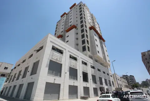 Palestinians participate in the opening ceremony of the Italian Tower rehabilitation project in Gaza city on July 19, 2023. The Italian tower, which was destroyed by Israeli air strike during the Israel-Gaza conflict on...