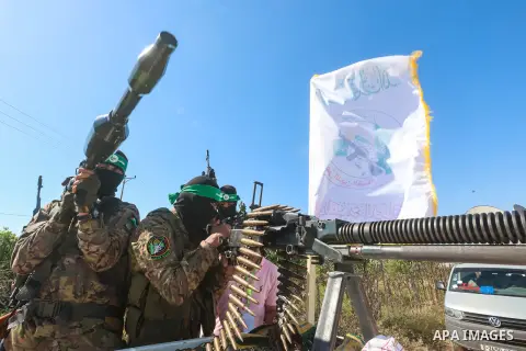 Members of Ezzedine al-Qassam Brigades, the military wing of the Palestinian Hamas movement display weapons which the group used it during the conflict with Israel on 2014 during an exhibition, east of Maghazi refugee ca...