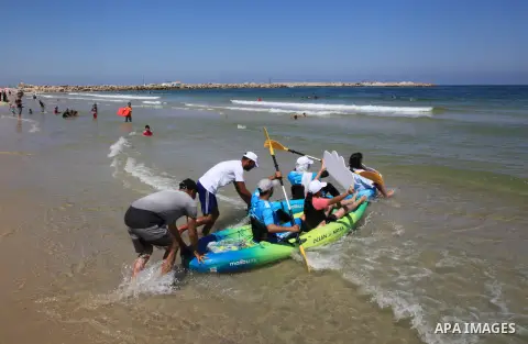 Palestinian players take part in the sailing and rowing championship on the shore of the Mediterranean, within the activities of the Palestinian Olympic Week in Gaza city, on July 22, 2023. Photo by Omar Ashtawy\ apaimag...