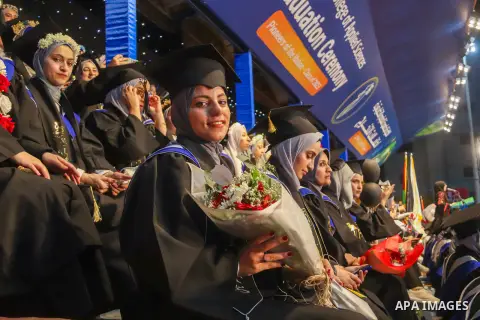 Palestinian students attend their graduation ceremony at University College of Applied Sciences (UCAS), in Gaza city on July 23, 2023. Photo by Hashem Zimmo\ apaimages