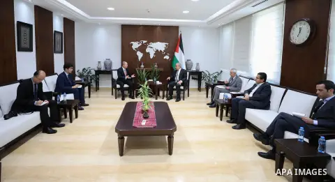 Palestinian Prime Minister Mohammad Shtayyeh receives the new ambassador of the People's Republic of China to Palestine, Zeng Jishin, in the West Bank city of Ramallah on July 26, 2023. Photo by Shadi Hatem\ apaimages