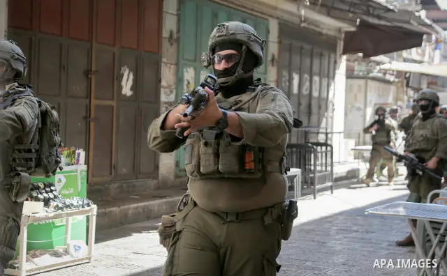 Israeli soldiers deploy during a raid on the Old City of Nablus, West Bank, on September 27, 2026. Israeli forces entered the city and spread through several areas, including streets leading toward the Old City. Local so...