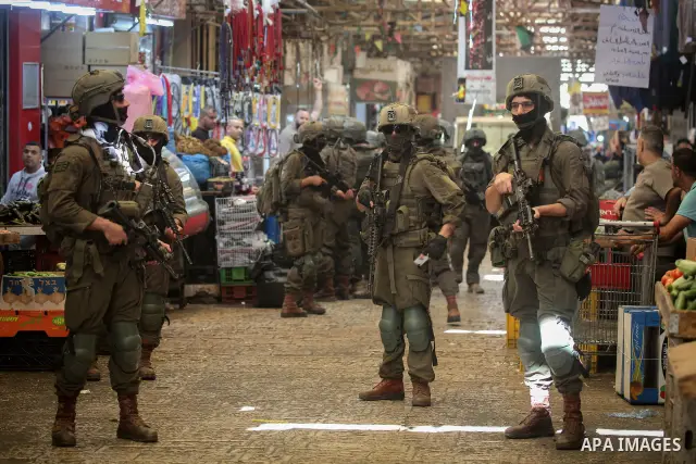 Israeli soldiers deploy during a raid on the Old City of Nablus, West Bank, on September 27, 2026. Israeli forces entered the city and spread through several areas, including streets leading toward the Old City. Local so...