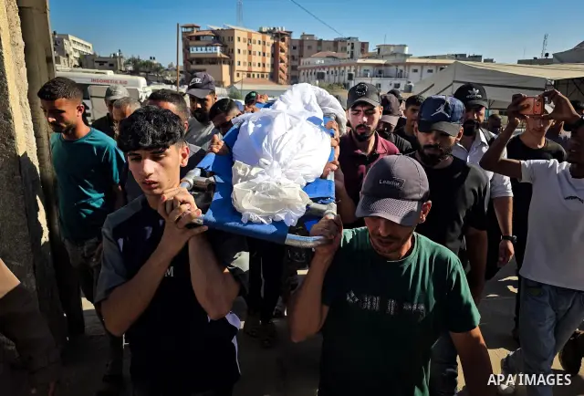 Palestinians mourn the body of eight-year-old Mohammed Saif al-Din al-Shakhriti at Nasser Medical Complex in Khan Younis, southern Gaza Strip, on September 27, 2026, after he was killed by Israeli gunfire while playing i...