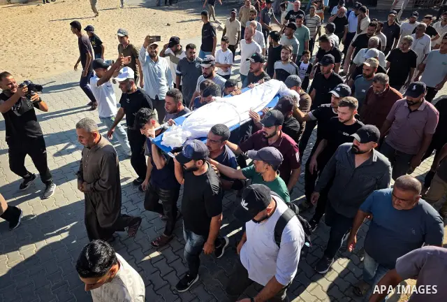 Palestinians mourn the body of eight-year-old Mohammed Saif al-Din al-Shakhriti at Nasser Medical Complex in Khan Younis, southern Gaza Strip, on September 27, 2026, after he was killed by Israeli gunfire while playing i...