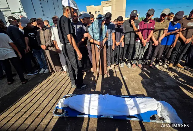 Palestinians mourn the body of eight-year-old Mohammed Saif al-Din al-Shakhriti at Nasser Medical Complex in Khan Younis, southern Gaza Strip, on September 27, 2026, after he was killed by Israeli gunfire while playing i...