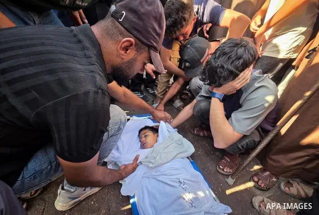 Palestinians mourn the body of eight-year-old Mohammed Saif al-Din al-Shakhriti at Nasser Medical Complex in Khan Younis, southern Gaza Strip, on September 27, 2026, after he was killed by Israeli gunfire while playing i...