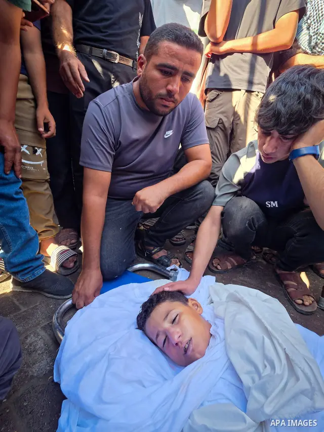 Palestinians mourn the body of eight-year-old Mohammed Saif al-Din al-Shakhriti at Nasser Medical Complex in Khan Younis, southern Gaza Strip, on September 27, 2026, after he was killed by Israeli gunfire while playing i...