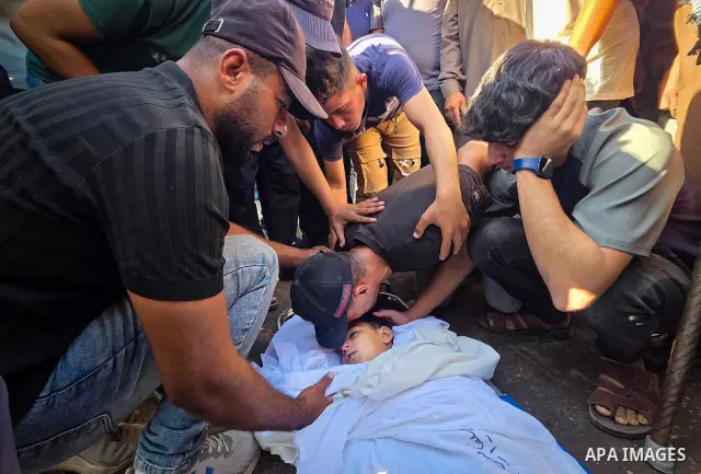 Palestinians mourn the body of eight-year-old Mohammed Saif al-Din al-Shakhriti at Nasser Medical Complex in Khan Younis, southern Gaza Strip, on September 27, 2026, after he was killed by Israeli gunfire while playing i...