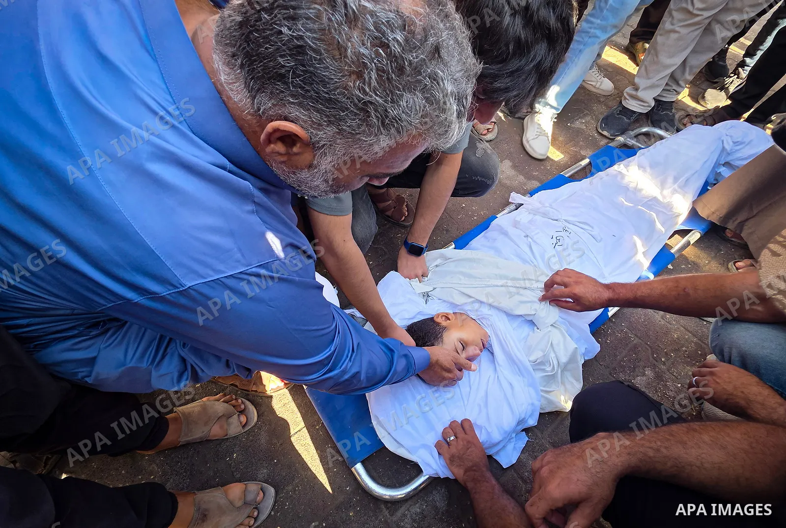 Palestinians mourn the body of eight-year-old Mohammed Saif al-Din al-Shakhriti at Nasser Medical Complex in Khan Younis, southern Gaza Strip, on September 27, 2026, after he was killed by Israeli gunfire while playing i...