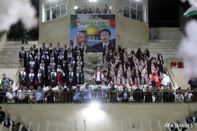 Brides and grooms take part in a mass wedding ceremony for 44 couples in Dura, near the West Bank city of Hebron, on September 26, 2026. Thousands of family members, residents and friends attended the celebration to mark...