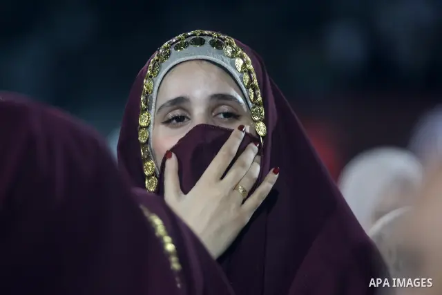 Brides and grooms take part in a mass wedding ceremony for 44 couples in Dura, near the West Bank city of Hebron, on September 26, 2026. Thousands of family members, residents and friends attended the celebration to mark...