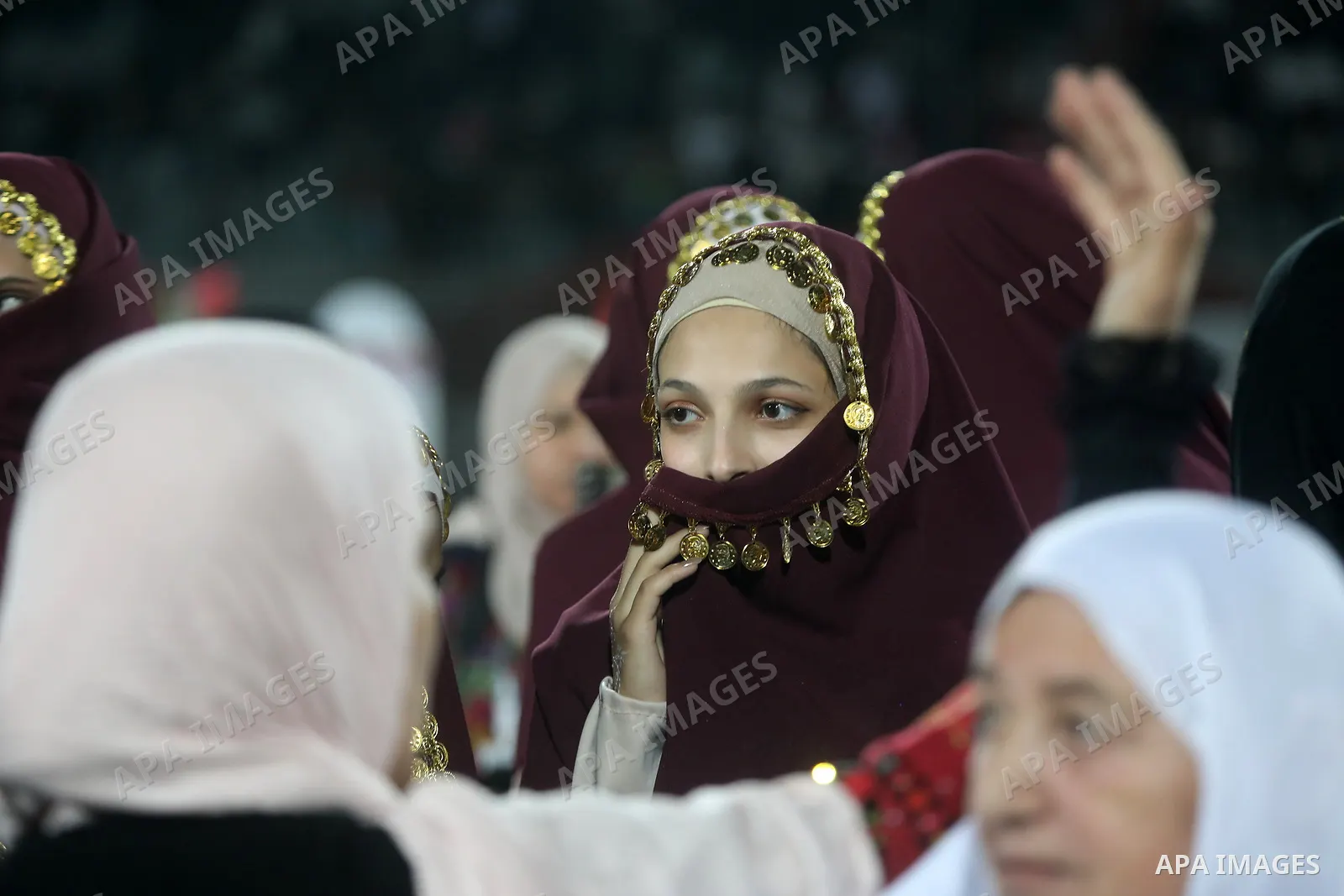 Brides and grooms take part in a mass wedding ceremony for 44 couples in Dura, near the West Bank city of Hebron, on September 26, 2026. Thousands of family members, residents and friends attended the celebration to mark...