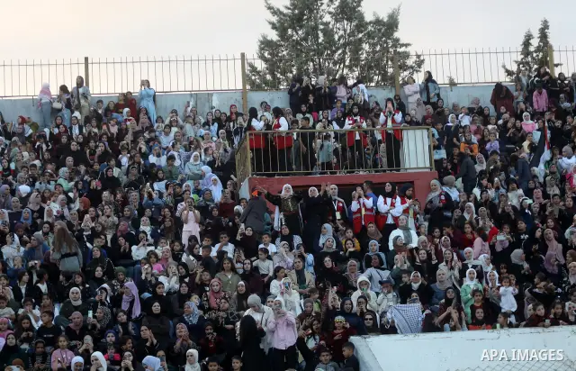 Brides and grooms take part in a mass wedding ceremony for 44 couples in Dura, near the West Bank city of Hebron, on September 26, 2026. Thousands of family members, residents and friends attended the celebration to mark...