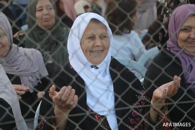 Brides and grooms take part in a mass wedding ceremony for 44 couples in Dura, near the West Bank city of Hebron, on September 26, 2026. Thousands of family members, residents and friends attended the celebration to mark...