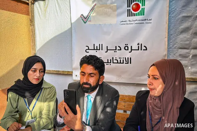 Palestinians submit nomination applications for their electoral lists for the 2026 legislative elections at the Central Elections Commission office in Deir el-Balah, central Gaza Strip, on September 26, 2026. The commiss...