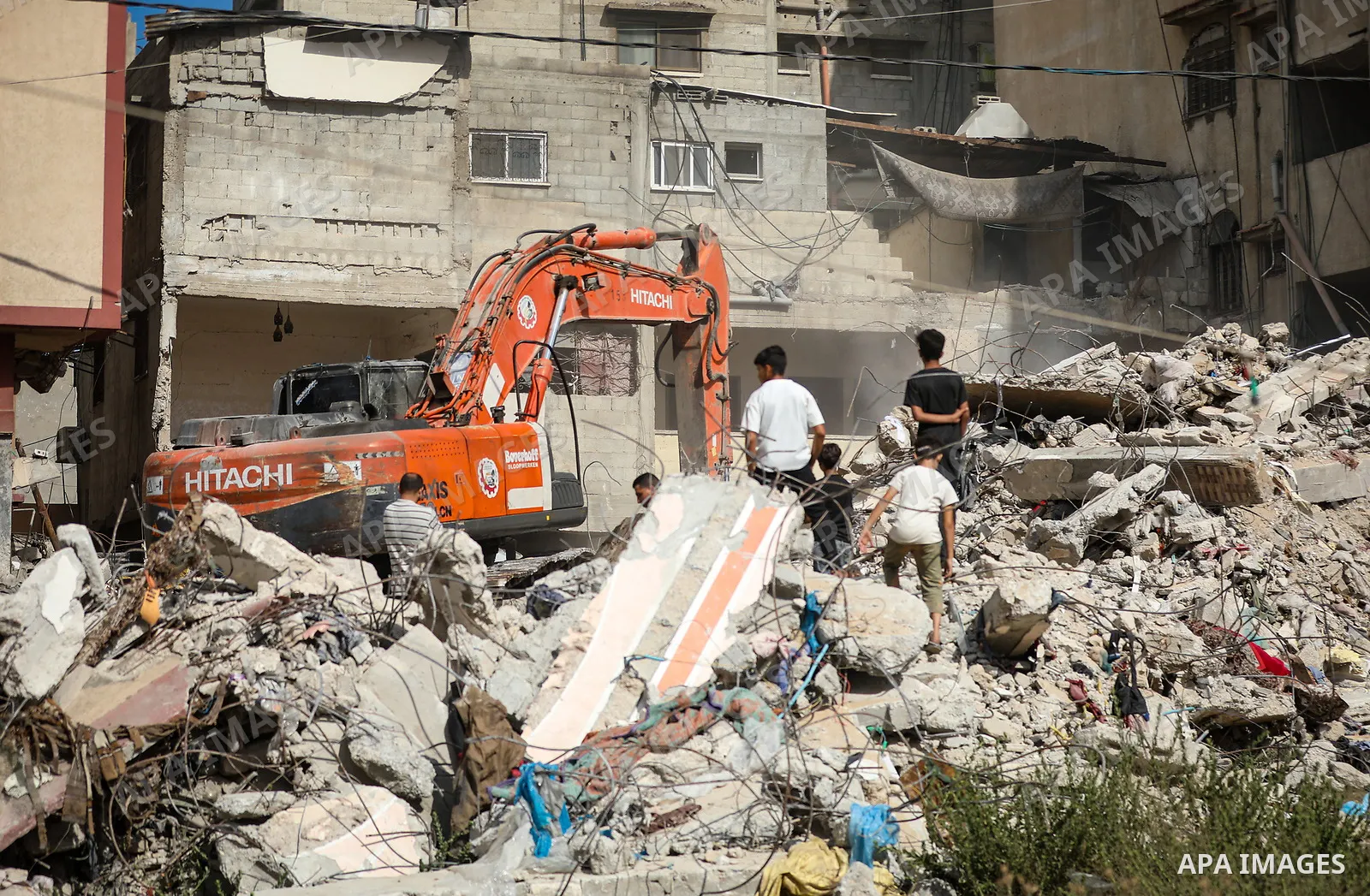 Civil Defense crews recover the bodies of Palestinians from beneath the rubble of a house belonging to the Attallah family, which was destroyed in an Israeli strike during the war, in Gaza City on September 26, 2026. Res...