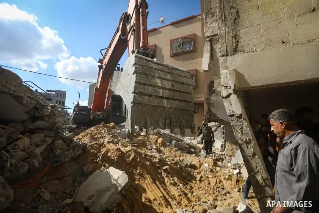 Civil Defense crews recover the bodies of Palestinians from beneath the rubble of a house belonging to the Attallah family, which was destroyed in an Israeli strike during the war, in Gaza City on September 26, 2026. Res...