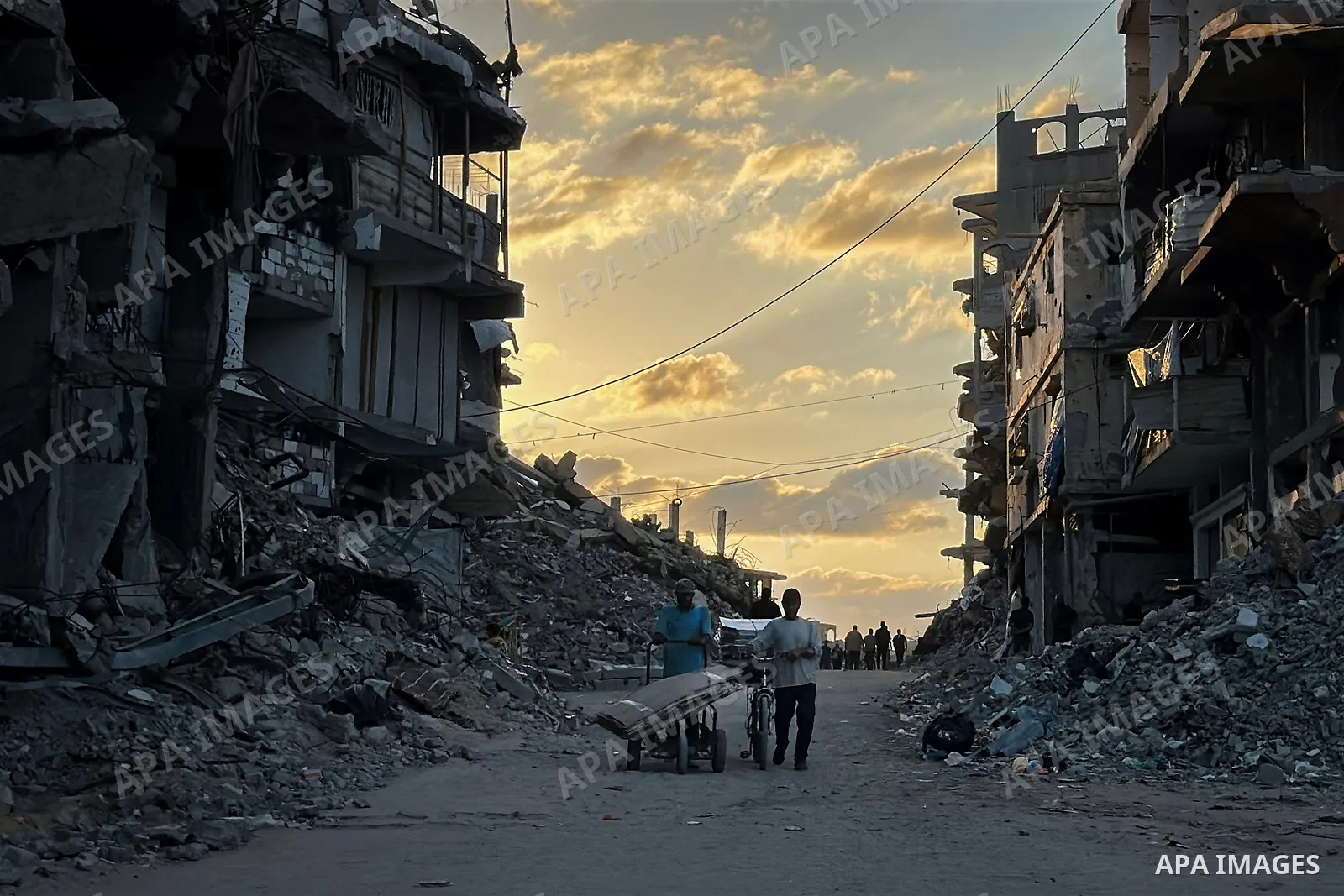 Displaced Palestinians continue their daily lives among destroyed buildings in Jabalia, northern Gaza Strip, on September 27, 2026, amid widespread destruction caused by the war and a severe housing crisis that limits fa...