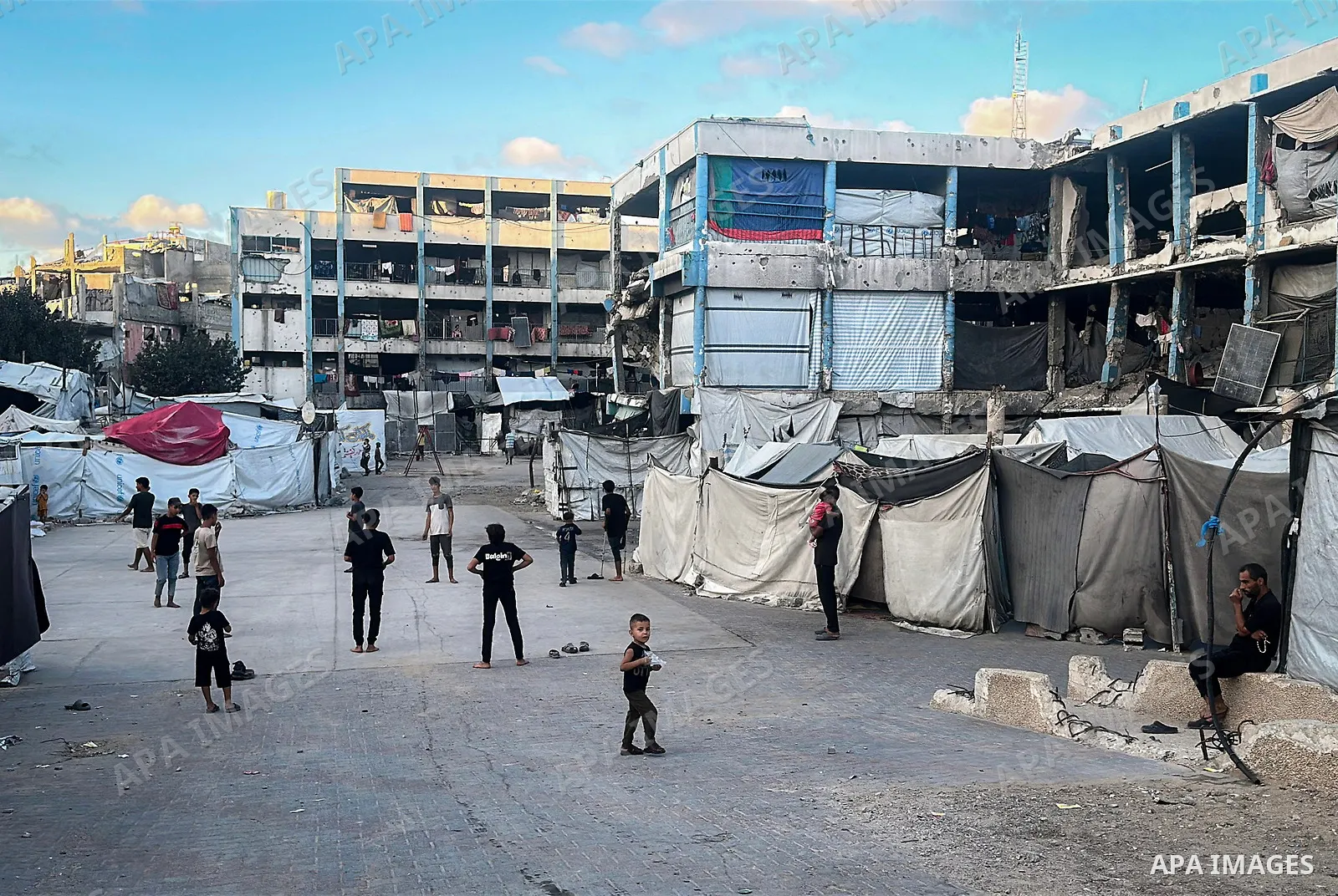 Displaced Palestinians continue their daily lives inside a school damaged during Israeli airstrikes in Jabalia, northern Gaza Strip, on September 27, 2026. The scene comes amid a continuing housing and education crisis i...
