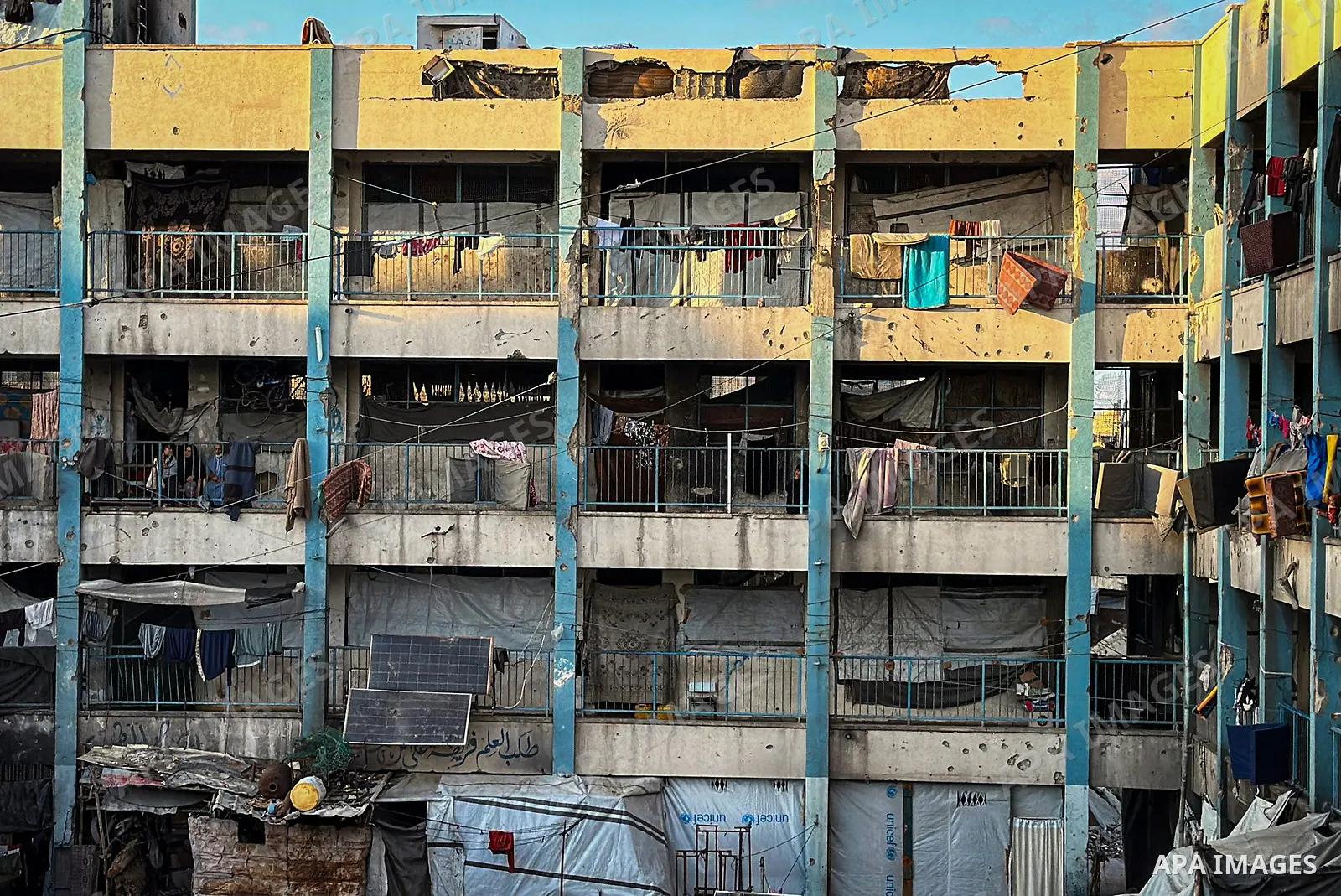 Displaced Palestinians continue their daily lives inside a school damaged during Israeli airstrikes in Jabalia, northern Gaza Strip, on September 27, 2026. The scene comes amid a continuing housing and education crisis i...