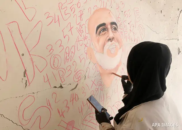 Palestinian artist Aseel Nasman creates artwork on the rubble of destroyed homes in the Gaza Strip on September 24, 2026. Nasman uses her art to portray international figures who have expressed support for Palestinians,...