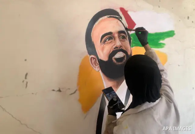 Palestinian artist Aseel Nasman creates artwork on the rubble of destroyed homes in the Gaza Strip on September 24, 2026. Nasman uses her art to portray international figures who have expressed support for Palestinians,...