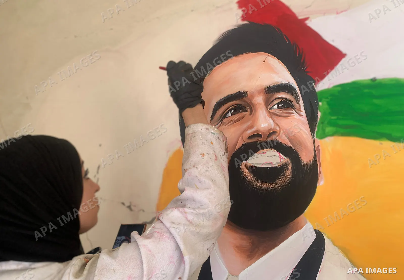 Palestinian artist Aseel Nasman creates artwork on the rubble of destroyed homes in the Gaza Strip on September 24, 2026. Nasman uses her art to portray international figures who have expressed support for Palestinians,...