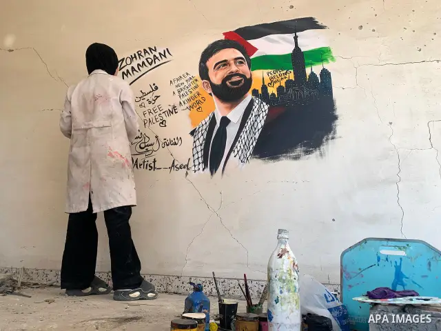Palestinian artist Aseel Nasman creates artwork on the rubble of destroyed homes in the Gaza Strip on September 24, 2026. Nasman uses her art to portray international figures who have expressed support for Palestinians,...