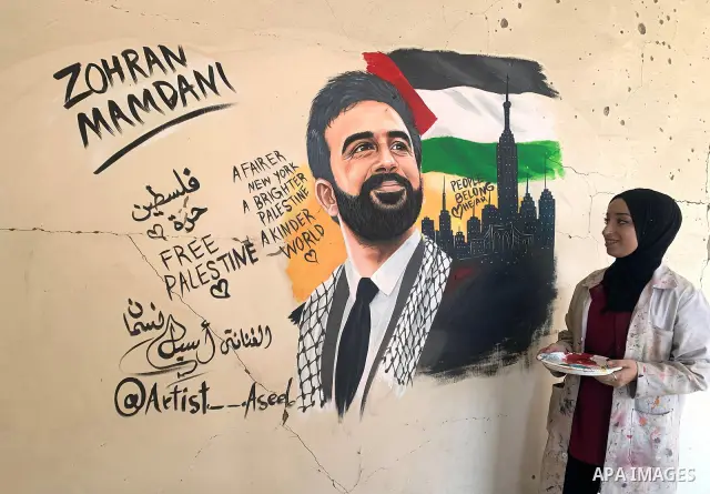 Palestinian artist Aseel Nasman creates artwork on the rubble of destroyed homes in the Gaza Strip on September 24, 2026. Nasman uses her art to portray international figures who have expressed support for Palestinians,...