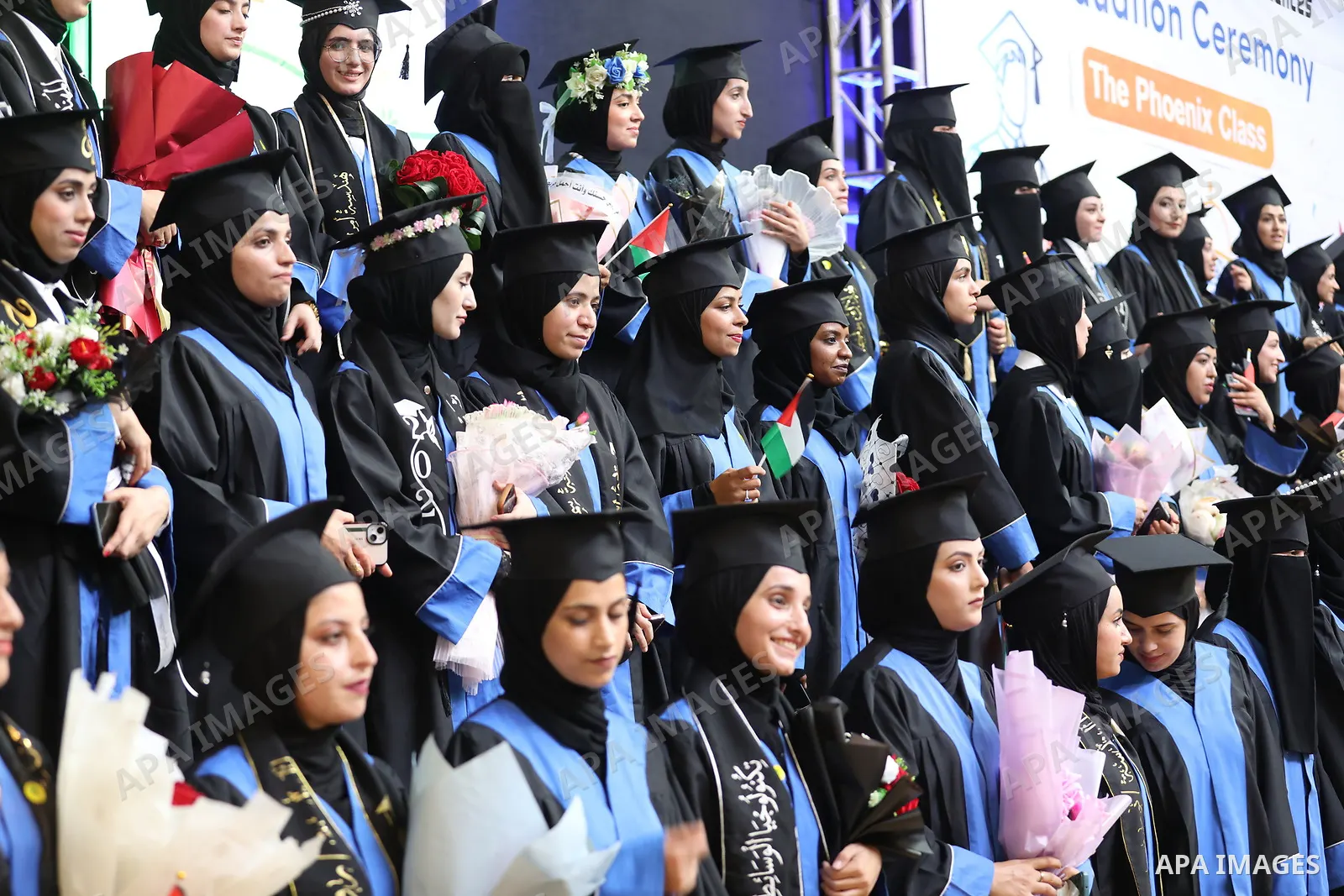 Palestinian students take part in a graduation ceremony for the University College of Applied Sciences at the Nuseirat refugee camp in the central Gaza Strip on September 24, 2026. The ceremony brought together graduates...